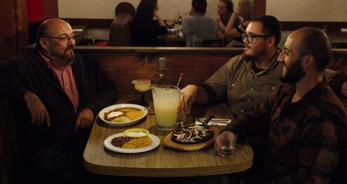 Phil Havlicek, Sal Lopez and Sal Sr sit and enjoy a meal at Celia's by the Beach.